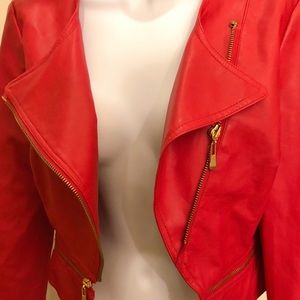 Red cropped moto jacket waist length